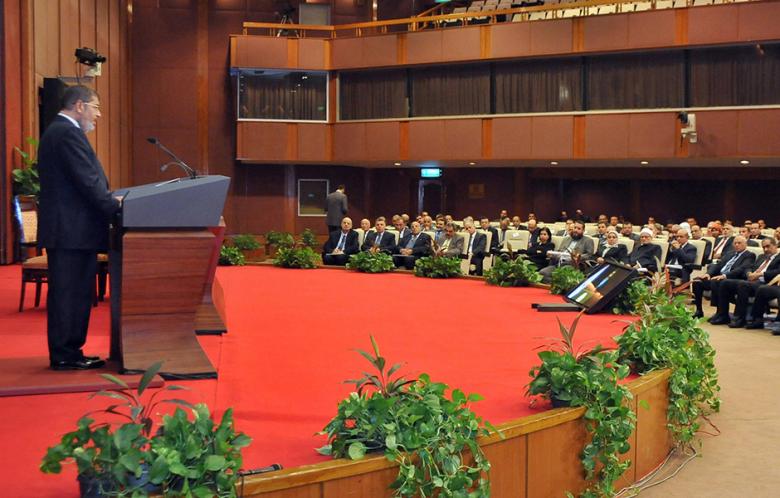 Egypt's president Mohamed Morsi delivers a speech during a ceremony where he received a copy of the final draft of Egyptian new constitution from the head of the Islamist-dominated constituent assembly, late on 1 December 2012. (Photo: AFP )