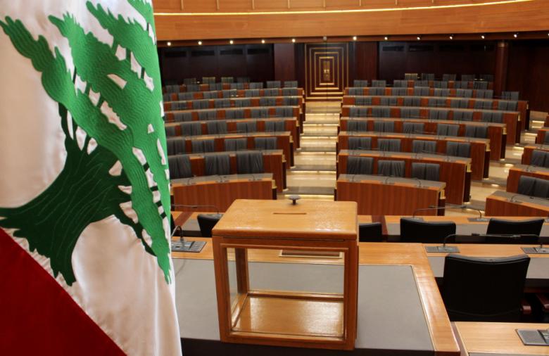 A ballot box sits on a table next to the national flag at the Lebanese Parliament in the capital Beirut on April 22, 2014 ahead of Wednesday's presidential election. (Photo: AFP)